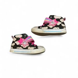 Multicoloured high top Twinkle Toes light up sneakers with stars and bows.